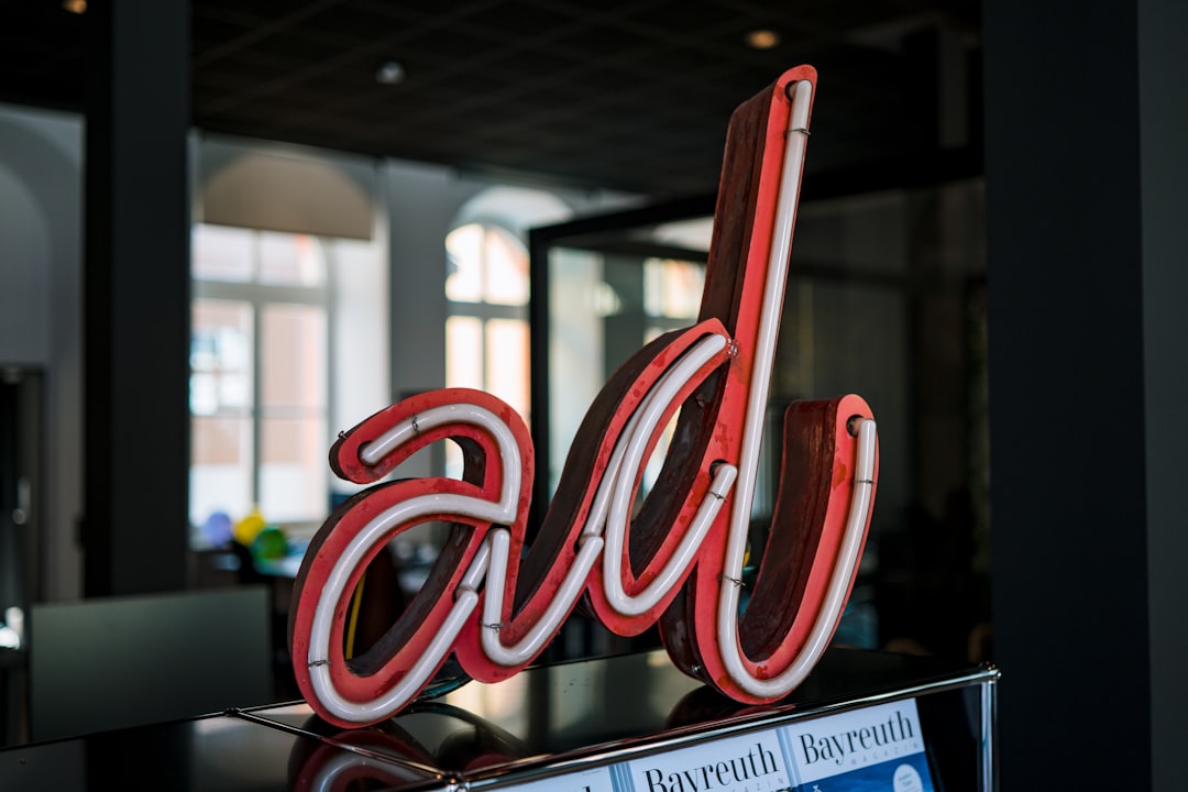 red-and-white-love-neon-light-signage-pgtuiohxas8